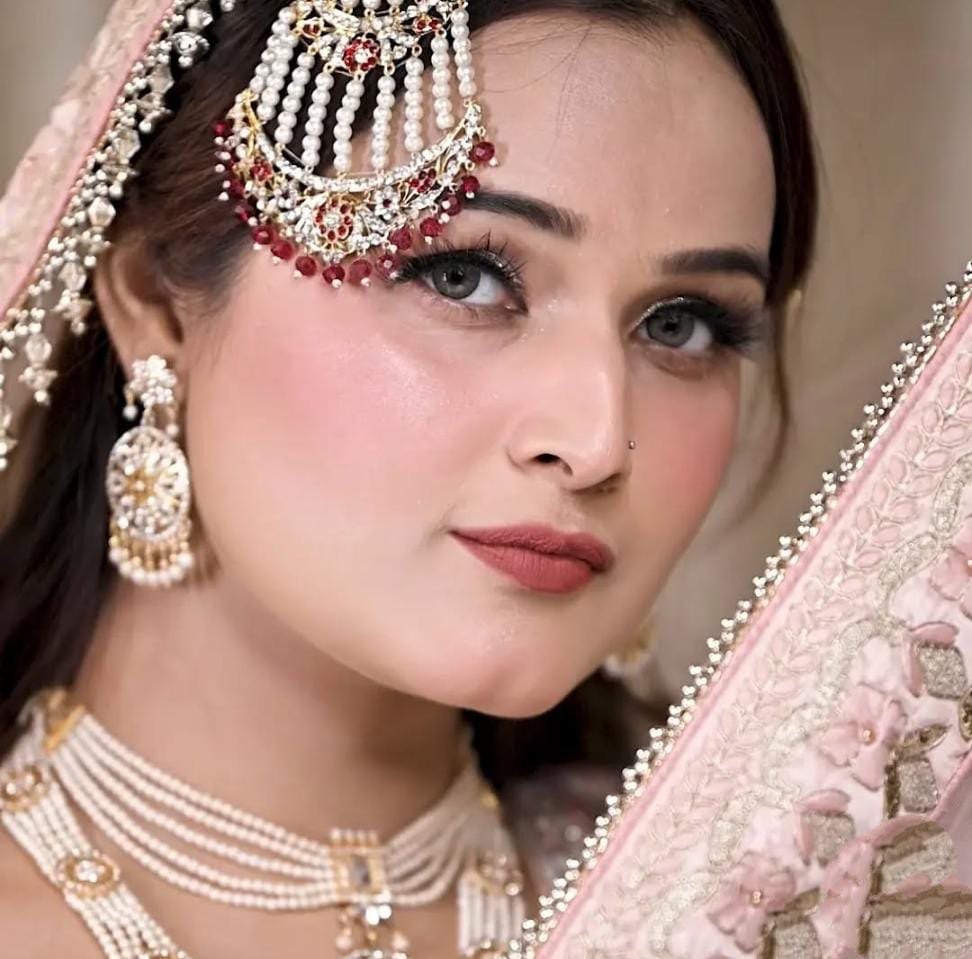 Close-up of bridal makeup artistry at Face2Face Salon & Academy